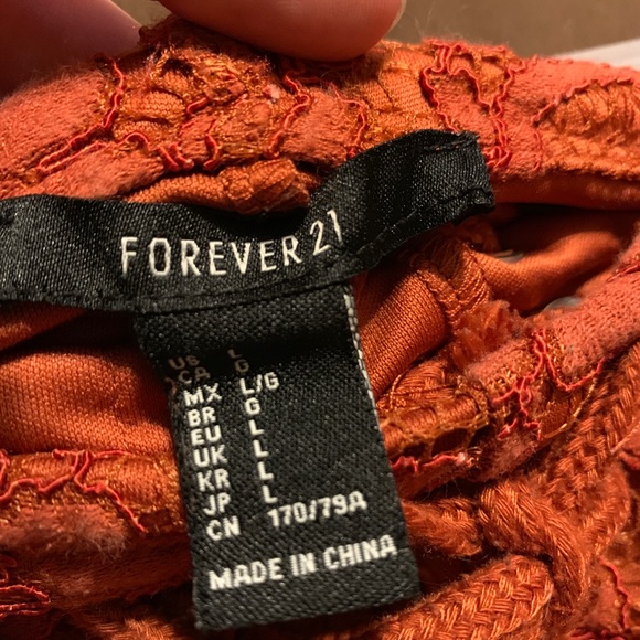 Lacey cute burnt orange shorts with lace up front - Picture 4 of 4